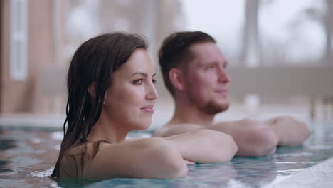 health-and-relax-man-and-woman-are-resting-in-thermal-bath-in-wellness-center-balneology-and-hydrotherapy